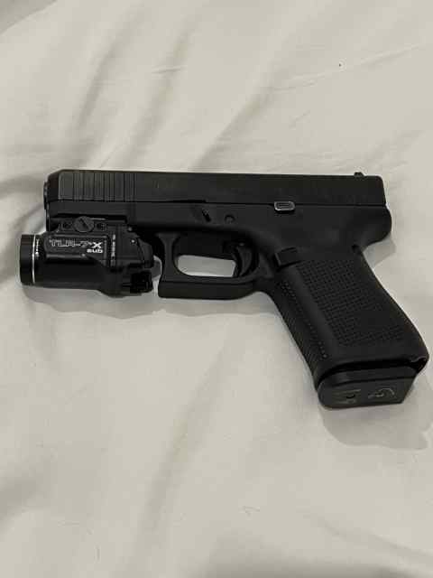 Glock 19 with TLR-7x sub and Walther P22 ca WTT